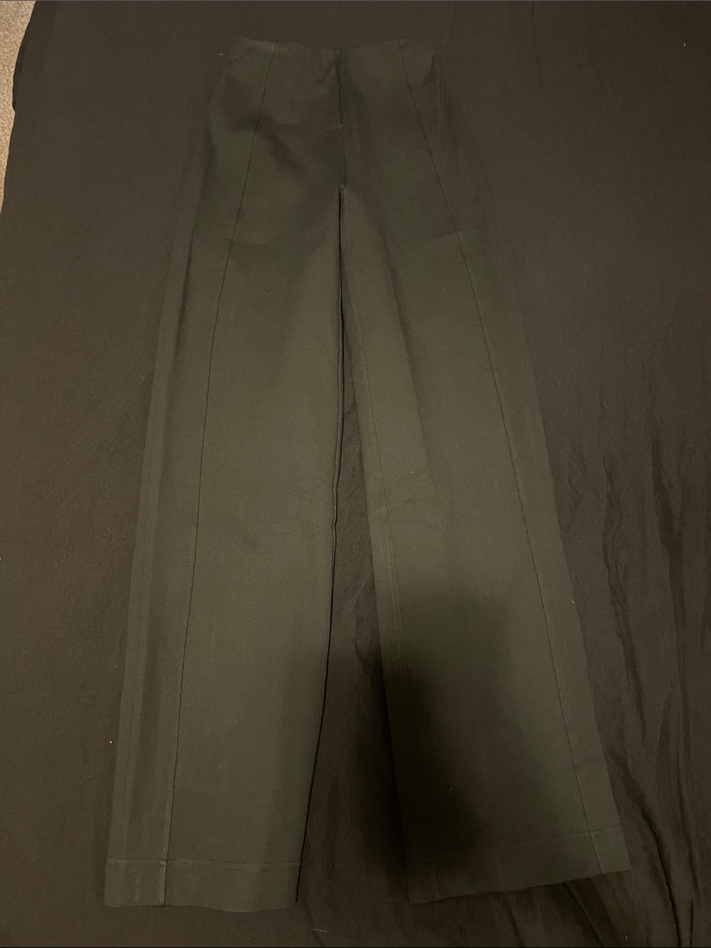 Dark green trousers